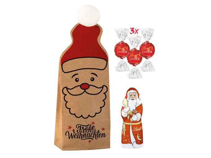 Eine Weihnachtstasche voller Süßigkeiten, inklusive Lindt Mini Weihnachtsmann und Lindor Kugeln.